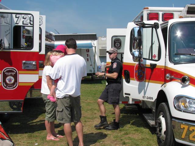 Fire Fighter Rob King greets the public and happily answers their questions.